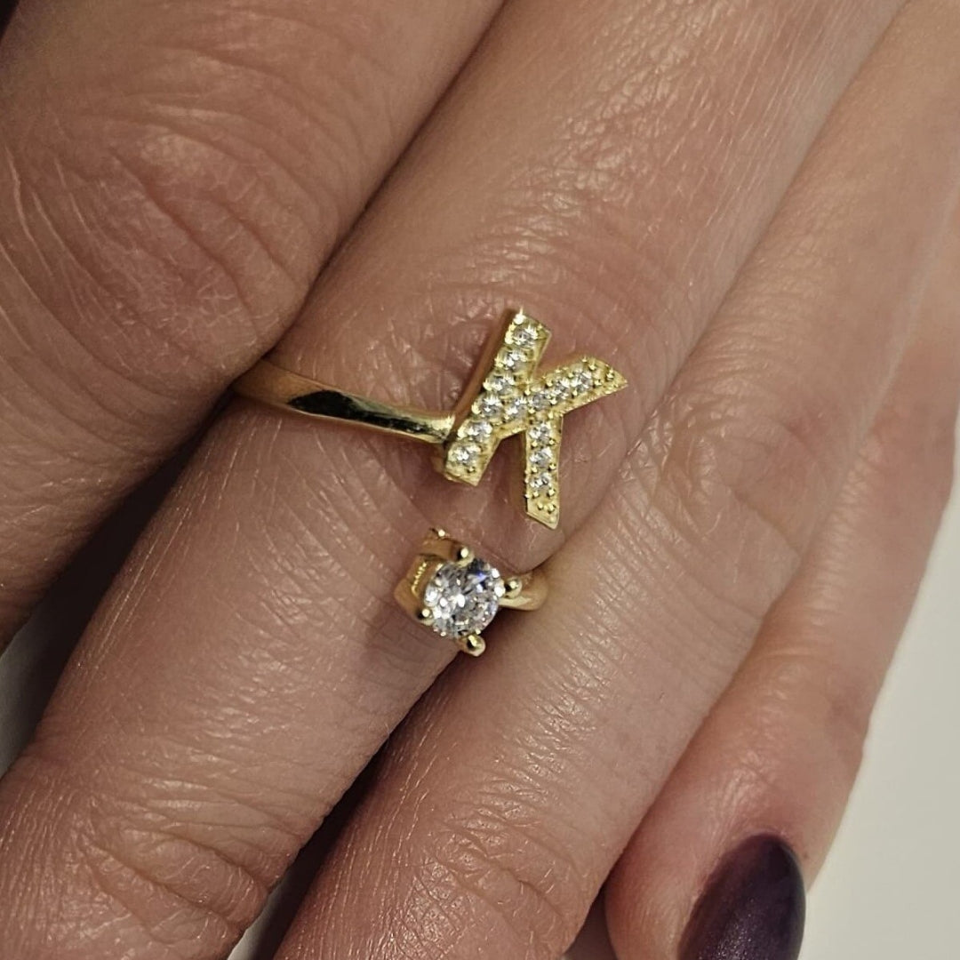 Inel reglabil cu initiala K din argint 925 suflat cu aur