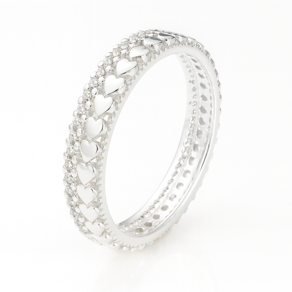 Inel din argint 925 pentru femei, model eternity cu inimi, lățime 4mm, greutate aproximativ 3.10 grame, finisaj lucios, livrat în cutie elegantă de bijuterii, marcat și verificat ANPC – simbol al iubirii eterne.