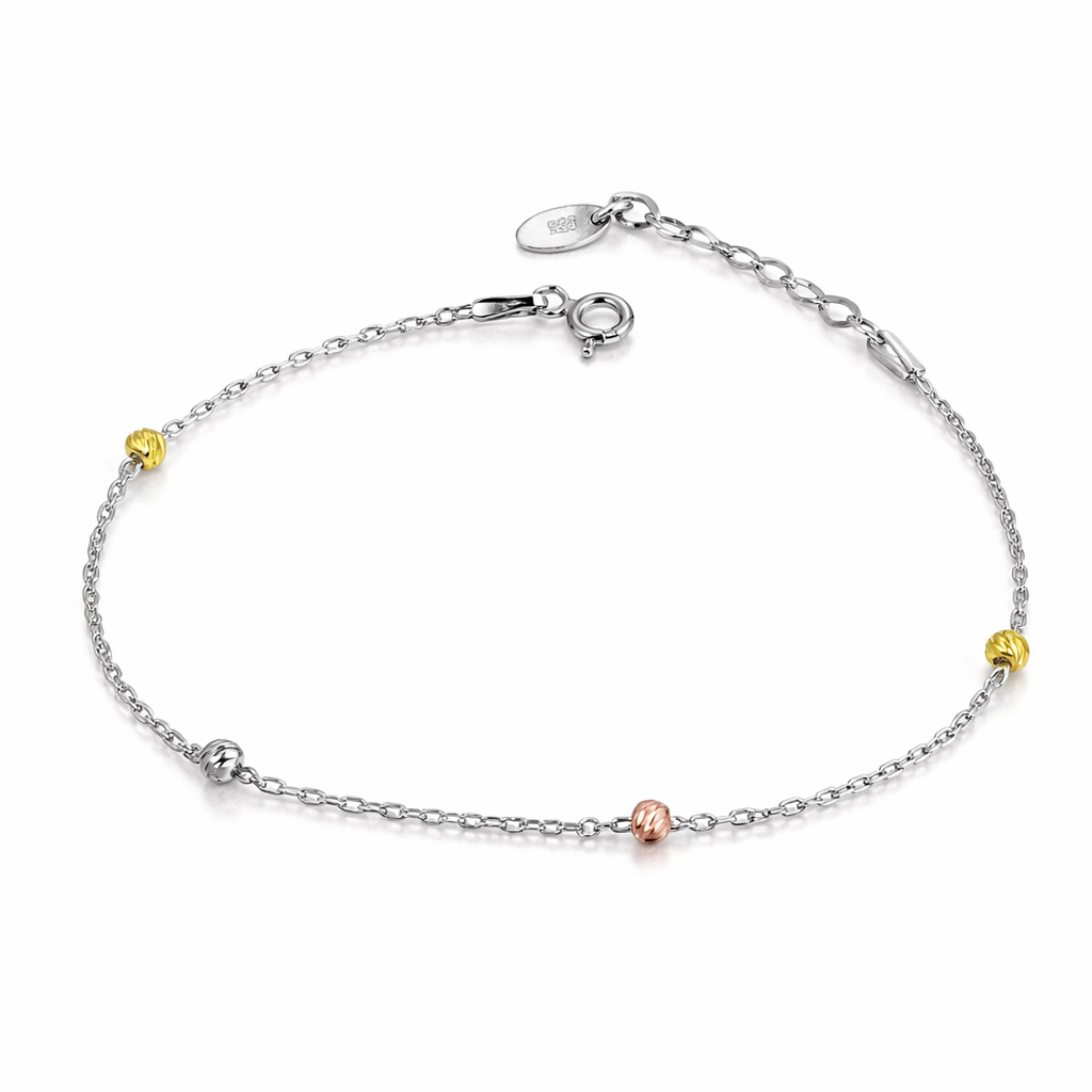 Brățară din argint 925 rodiat cu bile tricolore pe fundal alb lucios